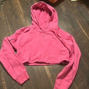Pink cropped Lululemon hoddie